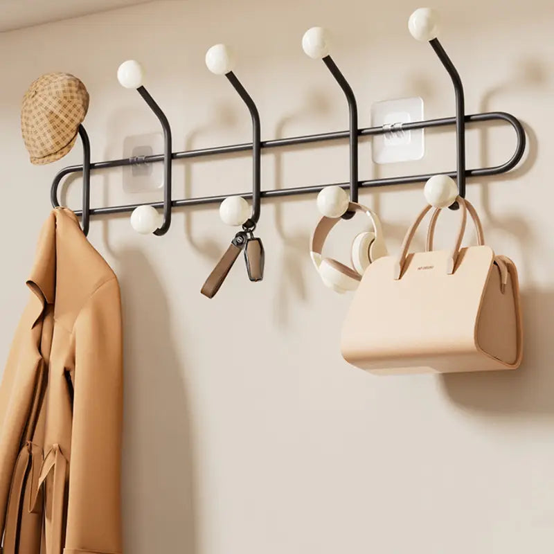 A 7pcs Wall Hook Rack Without Nails Featuring 12 Hooks