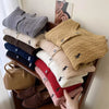 White knitted embroidered vintage cardigan + red cable knit jacket