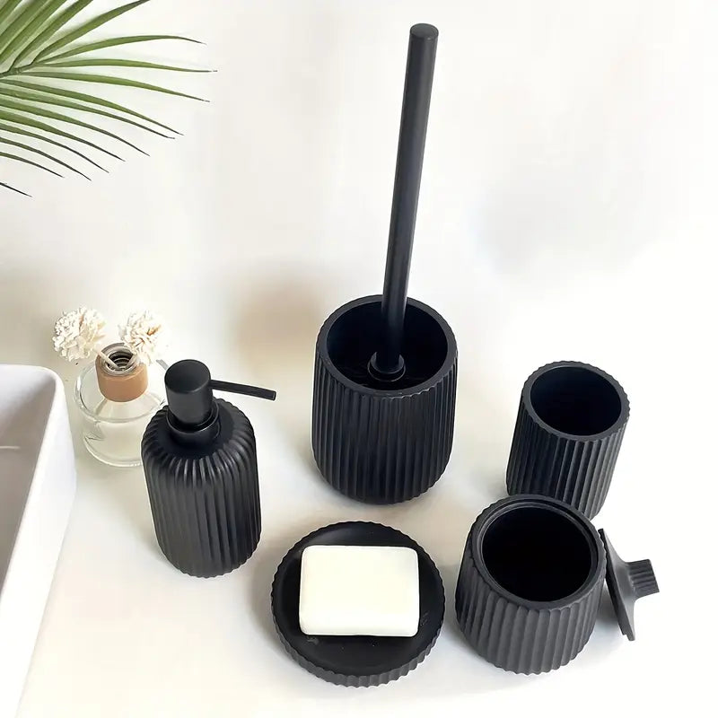 A Five-Piece Set Including Black And White Striped Lotion Bottles