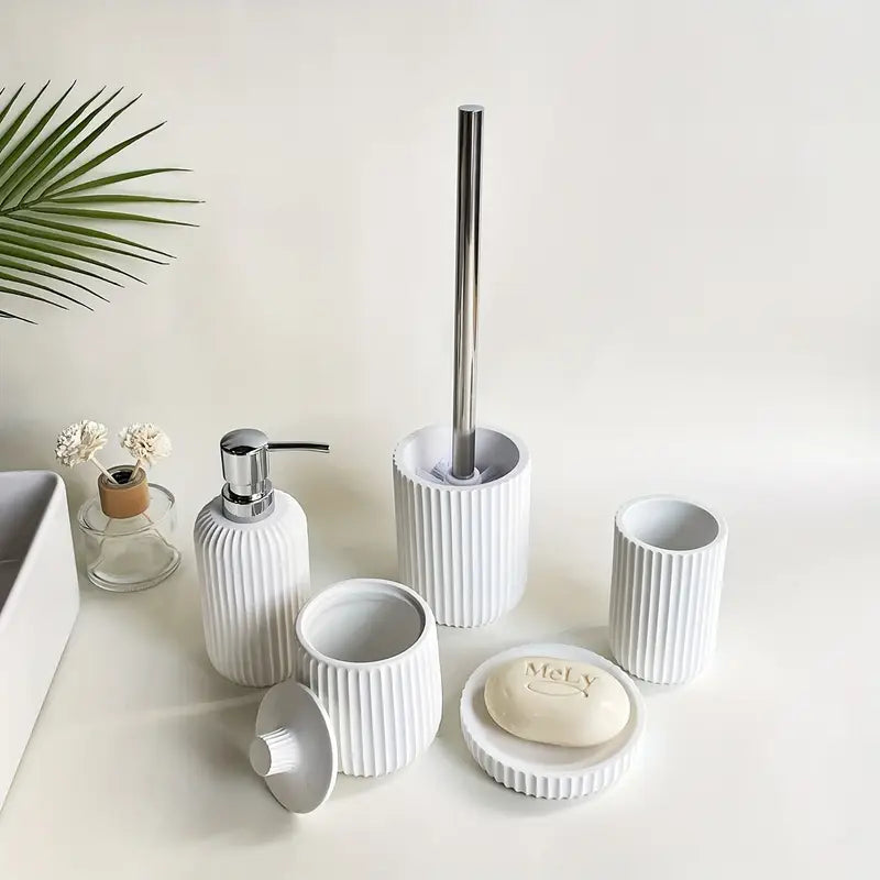 A Five-Piece Set Including Black And White Striped Lotion Bottles
