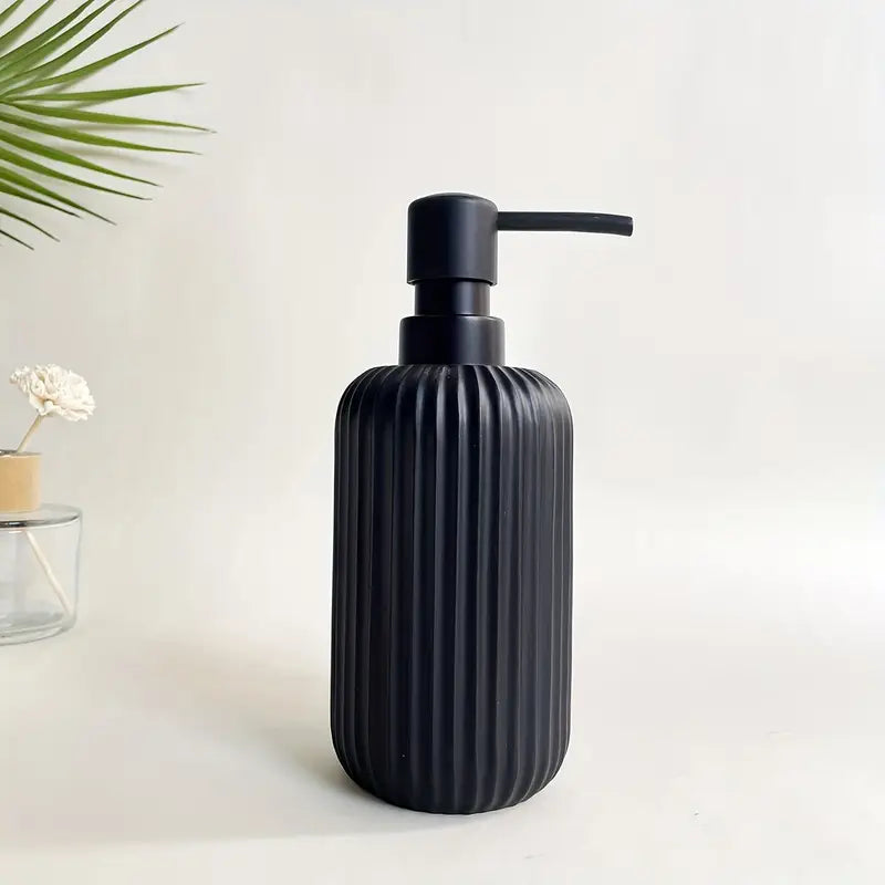A Five-Piece Set Including Black And White Striped Lotion Bottles