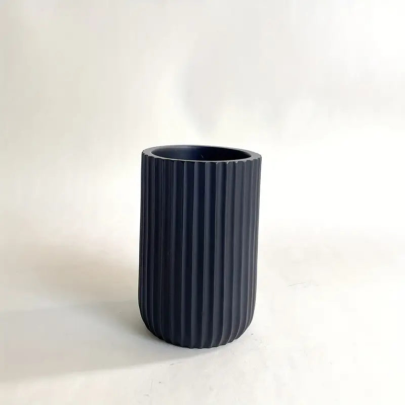A Five-Piece Set Including Black And White Striped Lotion Bottles